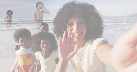Composite of happy african american family taking selfie, and running on beach. family, free time and wellbeing concept digitally generated image.の写真素材