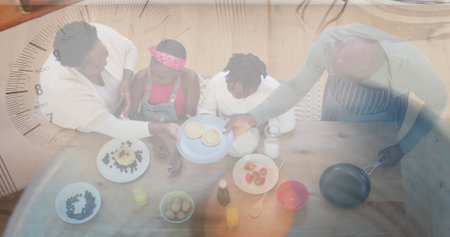 Composite of african american grandparents and grandchildren preparing food, and ingredients in bowl. family, free time and wellbeing concept digitally generated image.の写真素材