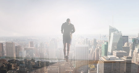 Composite of man running in a modern cityscape. health, fitness and wellbeing concept digitally...