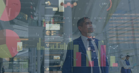 Image of financial data processing over diverse business people walking in modern office. global business, finances, connections and digital interface concept digitally generated image.の写真素材