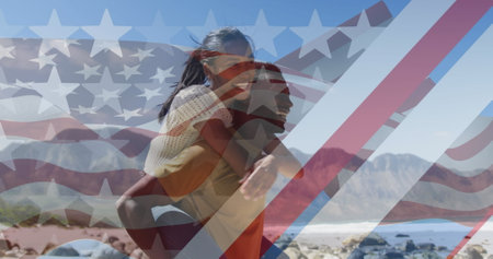 Image of american flag over smiling diverse couple carrying in mountains. patriotism and celebration concept digitally generated image.の写真素材