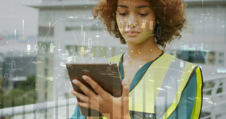 Image of statistics processing over female architect using tablet at construction site. business,...