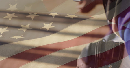 American flag image over close-up of person wearing glasses. Patriotism, USA, independence, freedom,...