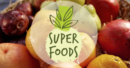 Super foods text banner against close up of fruit basket. organic, healthy and vegan food conceptの写真素材