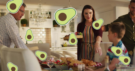 Image of avocado icons over happy caucasian family having dinner. fashion and lifestyle concept...