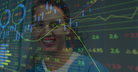 Image of financial data processing over smiling caucasian male doctor. global medicine, healthcare services and data processing concept digitally generated image.の写真素材
