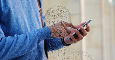 Image of rotating digital head over hands of caucasian man using smartphone. global network, connections, social media and technology concept digitally generated image.の写真素材