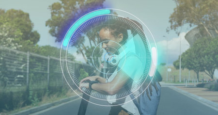 Neon round scanner against portrait of african american woman using her smartwatch on the street....
