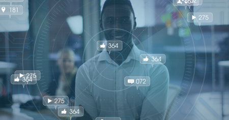 Image of social media text and icons over african american businessman. global social media, digital...