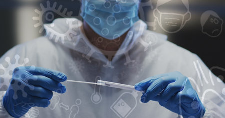 Image of medical icons over caucasian male doctor wearing face mask. global medicine, medical...