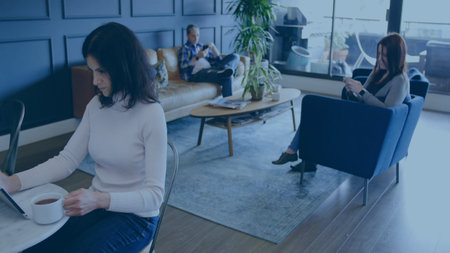 Colleagues are working in flat lounge illustration with tablet, smartphone, coffee mug for business. Casual, collaborative, modern, sophisticated, relaxation, workspace, interiorの写真素材