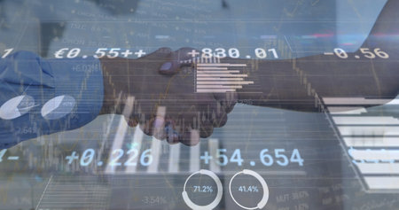 Image of financial data processing ove caucasian business people shaking hands. global business, finance and digital interface concept digitally generated image.の写真素材
