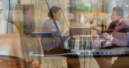 Image of men using computer over diverse business people. global business, success, connections and...