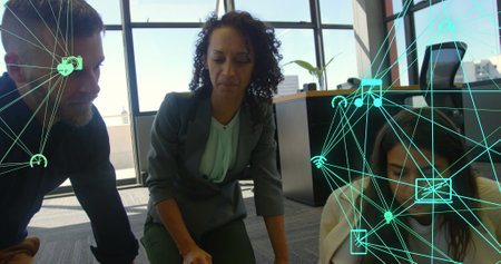 Image of network of connections with icons over diverse businesspeople in office. global network,...