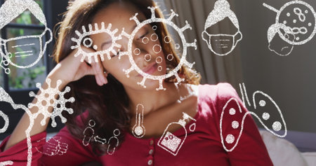 Multiple covid-19 concept icons floating against african american woman smiling at home. covid-19...