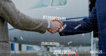 Image of data processing over diverse business people shaking hands. global business and digital...