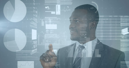 Statistical data processing against african american businessman touching an invisible screen. business data and analytics technology conceptの写真素材