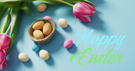 Image of happy easter, eggs and tulips on blue background. easter, spring, tradition and celebration concept digitlaly generated image.の写真素材