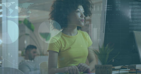 Image of data processing over biracial businesswoman in office. global business, finances, connections and digital interface concept digitally generated image.の写真素材