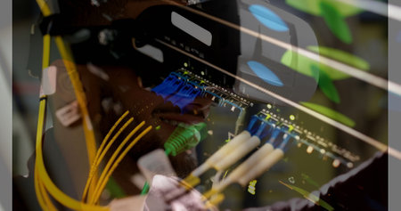 Image of server room over biracial man using vr headset. global technology and digital interface...