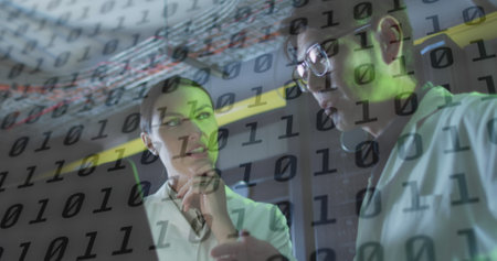 Image of data processing over diverse workers in server room. global technology and digital interface concept digitally generated image.の写真素材