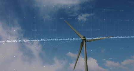 Image of a wind turbine with a blue sky and clouds in the background. The image has a graphical...