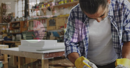 Smoothing woodworker shaping plank at woodworking shop, with power planer and gloves, copy space....