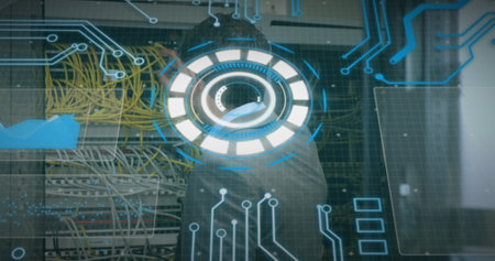 Image of scan scoping over caucasian male server room worker. Global connections, data processing and digital interface concept digitally generated image.の写真素材