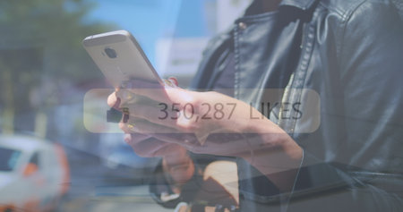 Holding smartphone, adult woman checking likes on city street, with 350,287 LIKES overlay. Urban,...