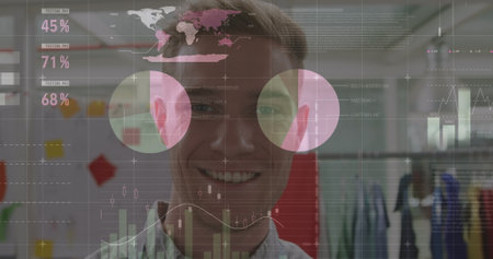 Statistical data processing against portrait of caucasian man smiling at office. Business data and...