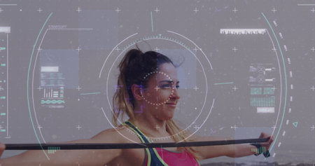 Image of digital interface over caucasian woman exercising. global sports, digital interface and data processing concept digitally generated image.の写真素材