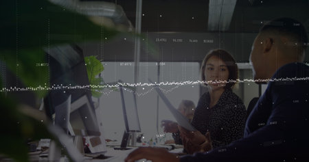 Image of financial data processing over diverse business people in office. Business, finance, data...