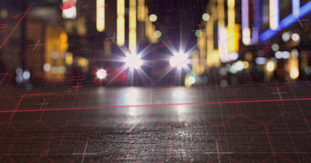 Image of digital screen over blurred night cityscape. Data processing, digital interface, communication and technology concept digitally generated image.の写真素材