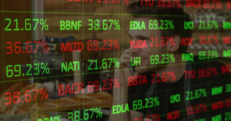 Image of financial data over caucasian man using smartphone. Finance, economy, business and wireless...