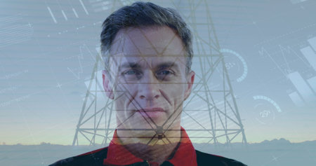 Statistical data processing over portrait of senior man with arms crossed against network towers. Global networking and technology conceptの写真素材