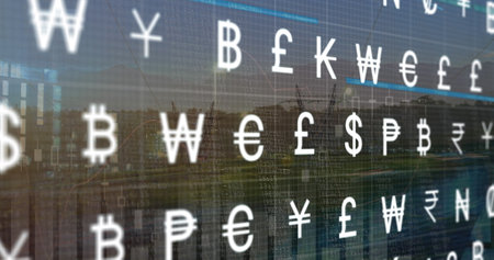 Image of currency symbols moving over cityscape. Finance, economy and technology concept digitally generated image.の写真素材