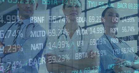 Image of stock market data processing over team of diverse medical health workers standing. Global...