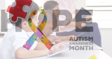 Image of colorful puzzle, ribbon and hope over diverse children with tablets. Autism awareness month and children health concept digitally generated image.の写真素材