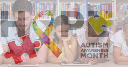 Image of hope, autism awareness month and colorful ribbon over diverse pupils at school. Learning, education, health and autism awareness concept digitally generated image.の写真素材