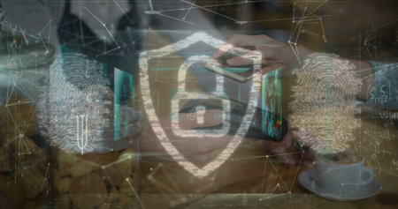 Image of security padlock and fingerprint scanner over woman making a payment with credit card. Cyber security and business technology conceptの写真素材