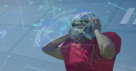 Image of digital interface over american football player. Global sports, digital interface and data processing concept digitally generated image.の写真素材