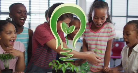 Image of bulb with plant over class of happy diverse pupils planting flowers at school. Ecology,...