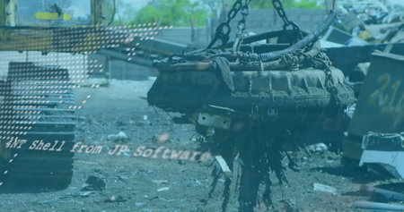 Hoisting electromagnet lifter raising corroded engine block over scrap yard, with heavy chains. Industrial, machinery, salvage, heavy-duty, rough, functional, outdoorの写真素材