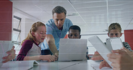 Image of graph over caucasian male teacher and class of diverse pupils using laptop. School, education, learning, finance and economy concept digitally generated image.の写真素材