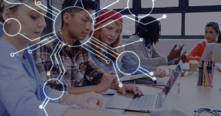 Image of network of connections over diverse female and male coworkers. Business, data processing,...