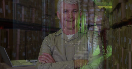 Image of globe over happy senior caucasian male warehouse worker. Business, finance, technology and delivery services concept digitally generated image.の写真素材