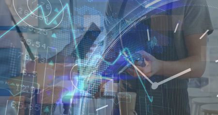 Image of financial graphs and clock hands of caucasian men using wireless payments. Business,...