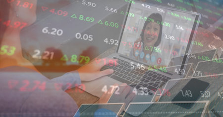 Image of financial data and caucasian woman having image call on laptop over solar panels. Green...