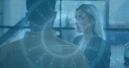Image of data processing over diverse business people talking in office. Global business and digital...