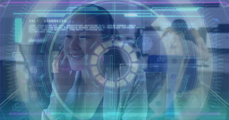 Image of data processing over asian businesswoman using phone headset in office. Global business and digital interface concept digitally generated image.の写真素材